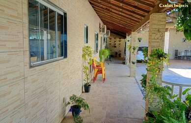 Imagem: A casa em condomínio possui 5 Dormitórios, 3 Banheiros, 6