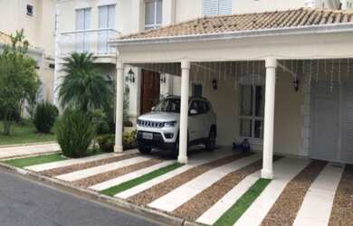 Imagem: A casa possui 5 Dormitórios, 5 Suítes, 6 Banheiros, 3 Vagas