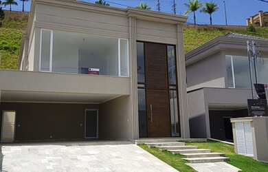 Imagem: A casa possui 3 Dormitórios, 3 Suítes, 4 Banheiros, 392m²