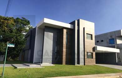 Imagem: A casa em condomínio possui 4 Dormitórios, 4 Suítes, 6 Banheiros