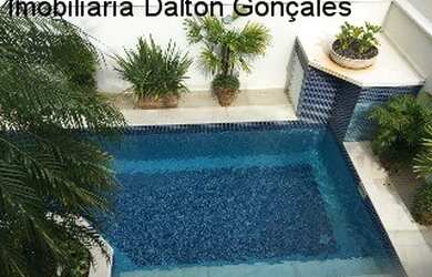 Imagem: A casa em condomínio possui 4 Dormitórios, 4 Suítes, 6 Banheiros