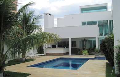 Imagem: A casa em condomínio possui 4 Dormitórios, 4 Suítes, 3 Vagas