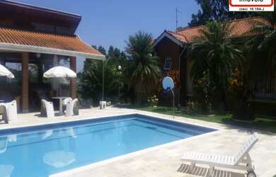 Imagem: A chácara possui 6 Dormitórios, 6 Suítes, 7 Banheiros, 10