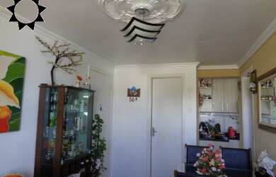 Imagem: O apartamento possui 2 Dormitórios, 1 Banheiro, 1 Vaga na garagem