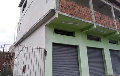 Imagem: A casa possui 3 Dormitórios e 2 Banheiros e está localizado