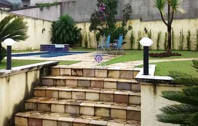 Imagem: A casa em condomínio possui 3 Dormitórios, 3 Suítes, 4 Banheiros