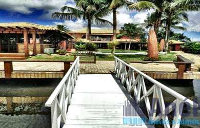 Imagem: A casa em condomínio possui 5 Dormitórios, 5 Suítes, 8 Banheiros