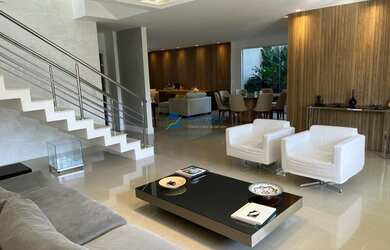 Imagem: A casa possui 6 Dormitórios, 4 Suítes, 8 Banheiros, 5 Vagas