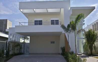 Imagem: A casa em condomínio possui 5 Dormitórios, 2 Suítes, 7 Banheiros