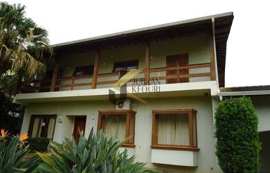 Imagem: A casa em condomínio possui 4 Dormitórios, 4 Suítes, 6 Banheiros