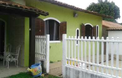 Imagem: A casa possui 2 Dormitórios, 1 Suíte, 2 Banheiros, 3 Vagas