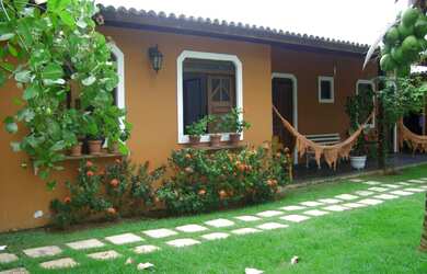 Imagem: A casa possui 5 Dormitórios, 3 Suítes, 4 Banheiros, 1.000m²