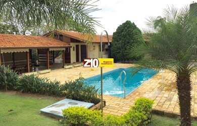 Imagem: A chácara possui 3 Dormitórios, 3 Suítes, 5 Banheiros e 2000m²