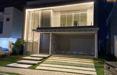 Imagem: A casa possui 4 Dormitórios, 4 Suítes, 5 Banheiros, 2 Vagas