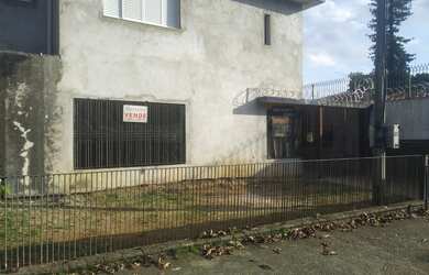 Imagem: A casa possui 4 Dormitórios, 2 Suítes, 4 Banheiros, 4 Vagas