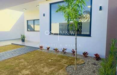 Imagem: A casa possui 2 Dormitórios, 2 Suítes, 1 Banheiro, 2 Vagas