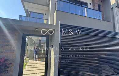 Imagem: A casa em condomínio possui 3 Dormitórios, 3 Suítes, 2 Vagas