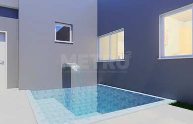 Imagem: A casa possui 3 Dormitórios, 3 Suítes, 2 Banheiros e está