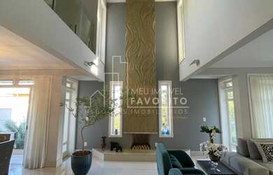 Imagem: A casa em condomínio possui 4 Dormitórios, 4 Suítes, 6 Banheiros