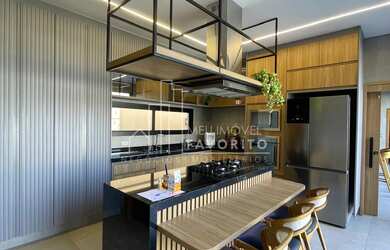 Imagem: A casa em condomínio possui 3 Dormitórios, 3 Suítes, 4 Banheiros