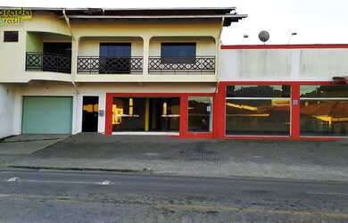 Imagem: A casa possui 2 Dormitórios, 1 Suíte, 1 Banheiro, 1 Vaga na