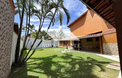 Imagem: A casa possui 3 Dormitórios, 3 Suítes, 1 Banheiro, 4 Vagas