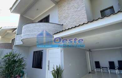 Imagem: A casa possui 2 Dormitórios, 1 Suíte, 1 Banheiro, 2 Vagas