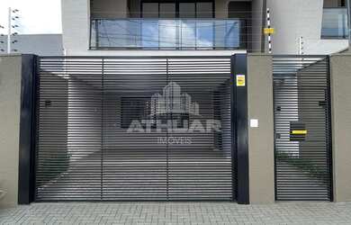 Imagem: A casa possui 2 Dormitórios, 1 Suíte, 2 Banheiros, 2 Vagas