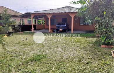 Imagem: A casa possui 3 Dormitórios, 3 Banheiros, 7 Vagas na garagem