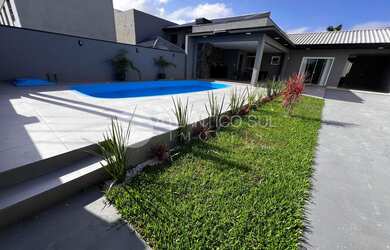 Imagem: A casa possui 2 Dormitórios, 1 Banheiro, 3 Vagas na garagem