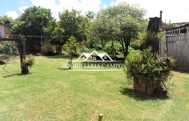 Imagem: O terreno possui 3 Dormitórios, 1 Banheiro, 1 Vaga na garagem