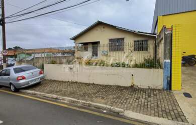 Imagem: O terreno possui 2 Dormitórios, 1 Banheiro, 1 Vaga na garagem