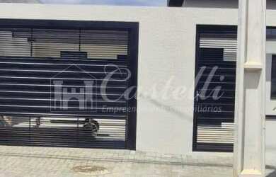 Imagem: A casa possui 3 Dormitórios, 1 Suíte, 1 Banheiro, 1 Vaga na