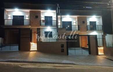 Imagem: A casa possui 3 Dormitórios, 3 Suítes, 1 Banheiro, 1 Vaga