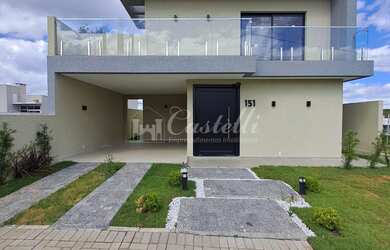 Imagem: A casa possui 3 Dormitórios, 1 Suíte, 1 Banheiro, 2 Vagas