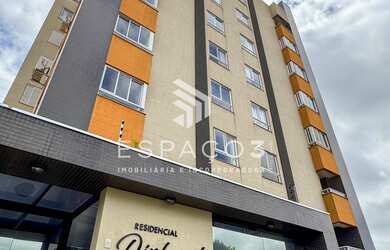 Imagem: O apartamento possui 2 Dormitórios, 1 Suíte, 2 Banheiros