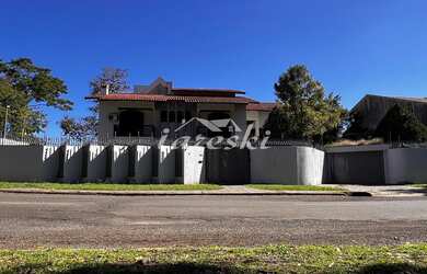 Imagem: A casa em condomínio possui 5 Dormitórios, 5 Suítes, 6 Banheiros