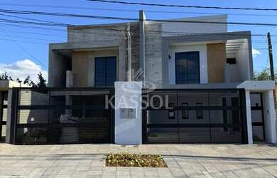 Imagem: A casa possui 2 Dormitórios, 1 Suíte, 2 Banheiros, 2 Vagas