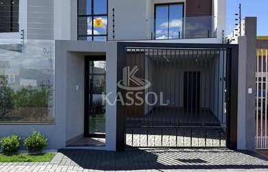 Imagem: A casa possui 2 Dormitórios, 1 Suíte, 2 Banheiros, 2 Vagas