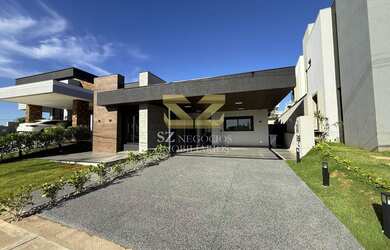 Imagem: A casa em condomínio possui 4 Dormitórios, 4 Suítes, 4 Vagas