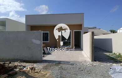 Imagem: A casa possui 2 Dormitórios, 1 Suíte, 1 Banheiro, 1 Vaga na