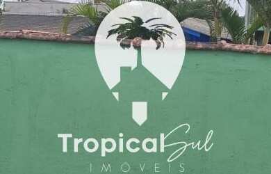 Imagem: A casa possui 4 Dormitórios, 2 Banheiros e 5 Vagas na garagem