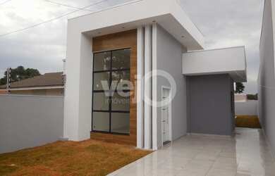 Imagem: A casa possui 2 Dormitórios, 1 Suíte, 2 Banheiros, 3 Vagas