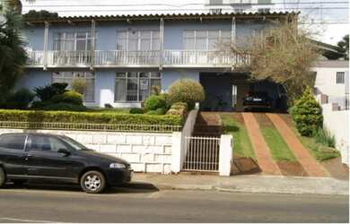 Imagem: A casa possui 4 Dormitórios, 2 Suítes, 4 Banheiros, 2 Vagas