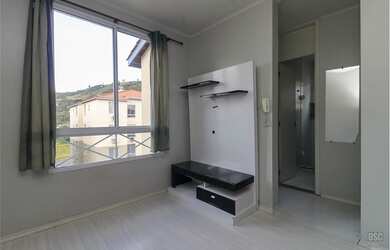 Imagem: O apartamento possui 2 Dormitórios, 1 Banheiro, 1 Vaga na garagem