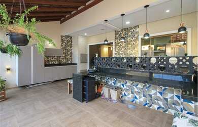 Imagem: A casa possui 3 Dormitórios, 3 Suítes, 7 Banheiros, 2 Vagas