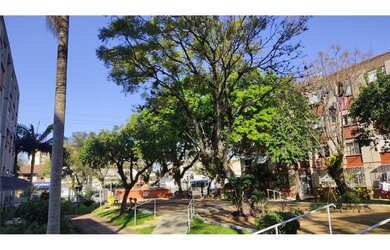 Imagem: O apartamento possui 3 Dormitórios, 1 Banheiro, 1 Vaga na garagem