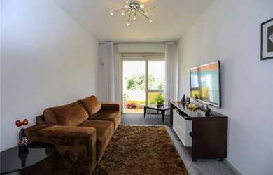 Imagem: O apartamento possui 2 Dormitórios, 1 Banheiro, 1 Vaga na garagem