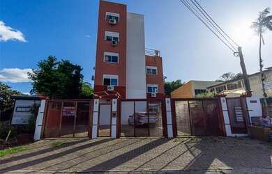 Imagem: O apartamento possui 2 Dormitórios, 1 Suíte, 2 Banheiros