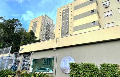 Imagem: O apartamento possui 2 Dormitórios, 1 Banheiro, 1 Vaga na garagem